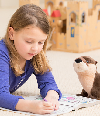 Young girl colouring in