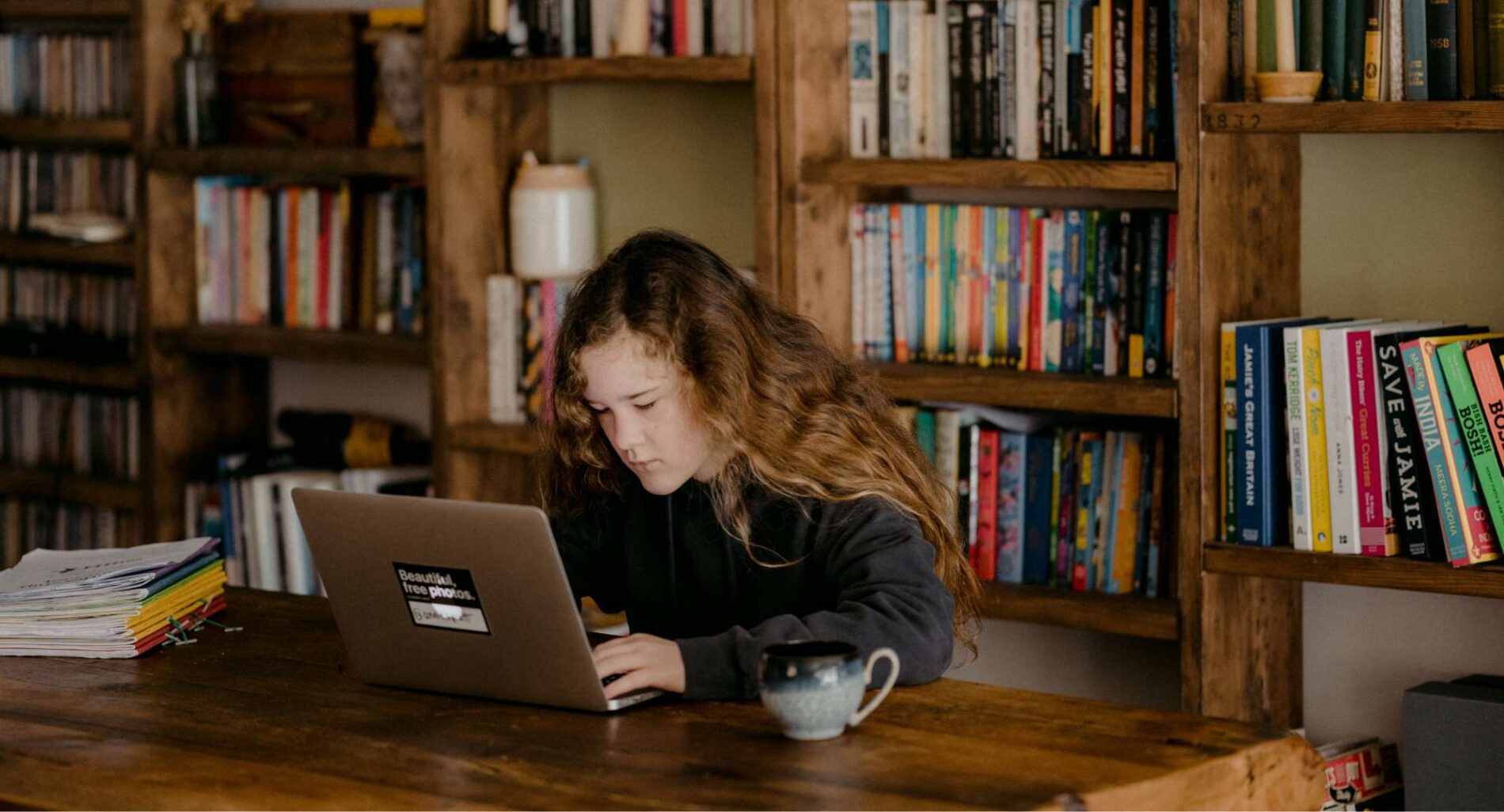 Girls desk at desk reading